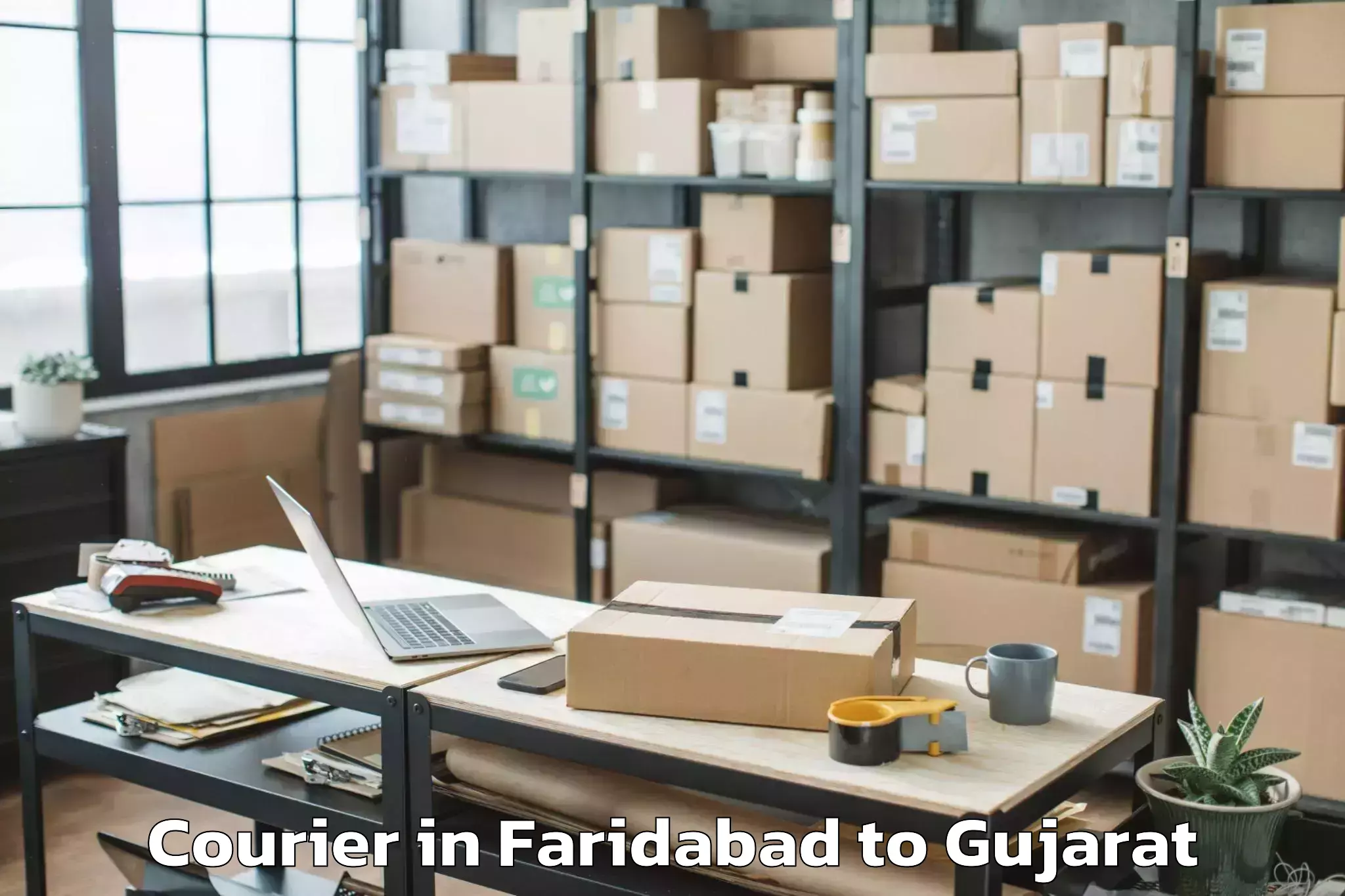 Get Faridabad to Dhoraji Courier